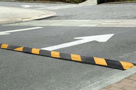 Striped speed bump on street. Road safety royalty free stock photo Speed Bump, Road Safety, Traffic Light, Street Photo, Bump, Free Stock Photos, Free Vector, Finance, Royalty Free Stock Photos