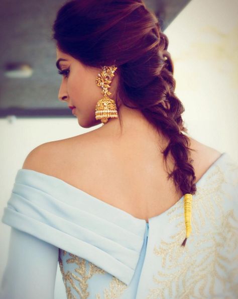 But this time, she paired it with these traditional jhumkas from Kalyan Jewellers. | Sonam Kapoor Paired Couture With Traditional Indian Earrings And It Was... French Plait, Bad Skin, Kalyan Jewellers, Wedge Hairstyles, Hair Growing, Asymmetrical Hairstyles, Shoulder Hair, Salwar Kamiz, Cool Braid Hairstyles