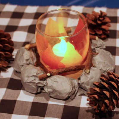 Crib this adorable faux-campfire centerpiece idea from CopyCrafts. Indoor Camping Party, Campfire Party, Camping Theme Birthday, Indoor Camping, Lumberjack Baby Shower, Lumberjack Baby, Lumberjack Birthday, Camping Theme Party, Camping Birthday Party