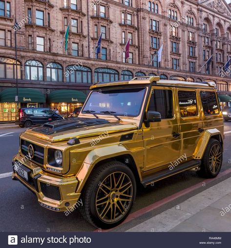 Download this stock image: Luxury car in gold paint, Mercedes Benz W463, G-Class, Brabus G850 6.0 Widestar, parked in front of Harrods department store - RA46MM from Alamy's library of millions of high resolution stock photos, illustrations and vectors. Luxury Cars Inside, Gold Cars, Lowrider Show, Car Gold, Toyota Trueno, Cars Inside, Cars Toyota, Car Side View, R34 Gtr