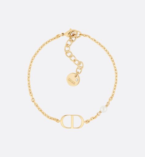 Petit CD Bracelet Gold-Finish Metal with a White Resin Pearl | DIOR Christian Dior, Cd Bracelet, Resin Pearl, Dior Bracelets, America And Canada, Metal Chain, Gold Finish, Luxury Handbags, Gold Color