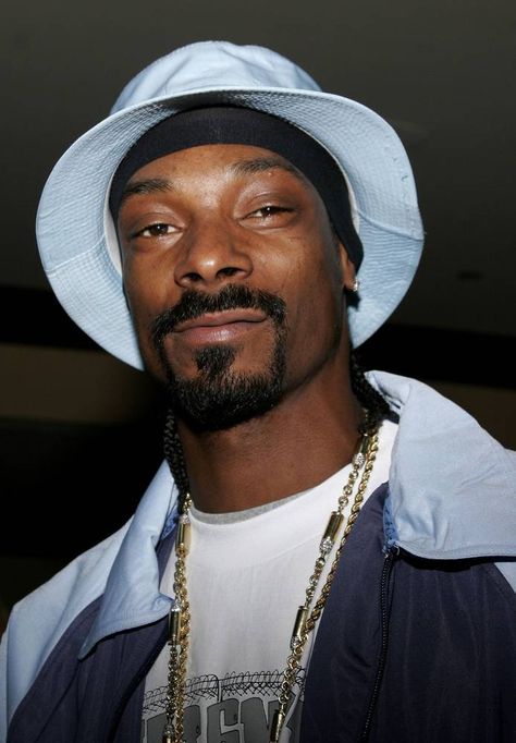 Rapper Snoop Dogg and his bodyguard were charged with the murder of a rival gang member. Snoop Dogg was defended by Johnny Cochran and was acquitted after years of court battles. Famous Black People, Trinidad James, Gang Member, Snoop Dog, Celebrity List, Music Pics, Gangsta Rap, Hyatt Regency, Celebrities Humor