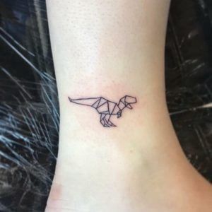 Animal Tattoos and their Meanings | by Jhaiho | Medium Dinasour Tattoo, Soul Tattoos, Origami Dinosaur, T Rex Tattoo, Tatuaje Trash Polka, Dinosaur Origami, Dinosaur Tattoo, Dinosaur Cute, Minimalist Tattoo Meaning