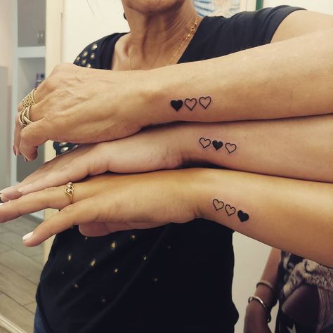 Sister Tattoos For 3 Hearts, 3 Hearts Wrist Tattoo, Three Hearts Tattoo Sisters, 3 Hearts Tattoo Ideas On Wrist, Trio Friend Tattoo Ideas, 3 Heart Tattoo On Wrist, Siblings Heart Tattoo, Best Friend Heart Tattoo, Heart Sibling Tattoo