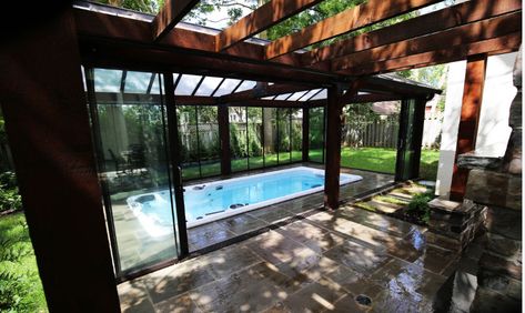 Indoor Pool and Hot Tub Ideas Swim With Style At Home (3) Indoor Pool And Sauna, Indoor Plunge Pool Ideas, Indoor Swim Spa Ideas, Swim Spa In Greenhouse, Half Indoor Half Outdoor Pool, Swim Spa Enclosure Ideas, Indoor Hot Tub Room Ideas, Indoor Pools In Houses, Indoor Swimming Pools Home