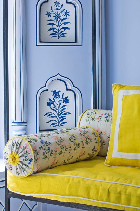 A daybed is upholstered in a bright lemon yellow, which accents the beautiful powder blue walls in Mumbai, India's Gem Palace jewelry store. Jaipur Wall Art, Mughal Interior, Jaipur Furniture, Powder Blue Walls, Rajasthani Interior Design, Blue Wall Design, Mumbai Photos, Jaipur Design, Bar Palladio