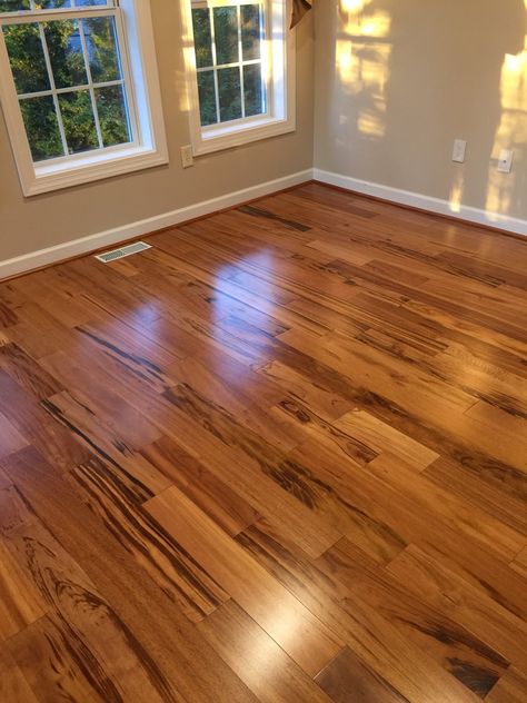 Wooden Flooring Drawing Room, Wood Flooring And Paint Combinations, Tiles For Bedroom Floor Ideas, Aesthetic Flooring Ideas, Tiger Wood Flooring, Wooden Flooring Design Ideas, How To Style Orange Wood Floors, Brown Wood Floors Bedroom, Hardwood Floor Apartment