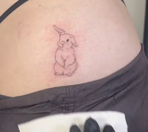 Bunny Hip Tattoo, Red Rabbit Tattoo, Bunny Eating Strawberry Tattoo, Bunny Rabbit Tattoo Small, Dainty Rabbit Tattoo, Stuffed Rabbit Tattoo, Bunny Holding Flower Tattoo, Tattoo Bunny Rabbit, Rabbit Tattoo Fine Line