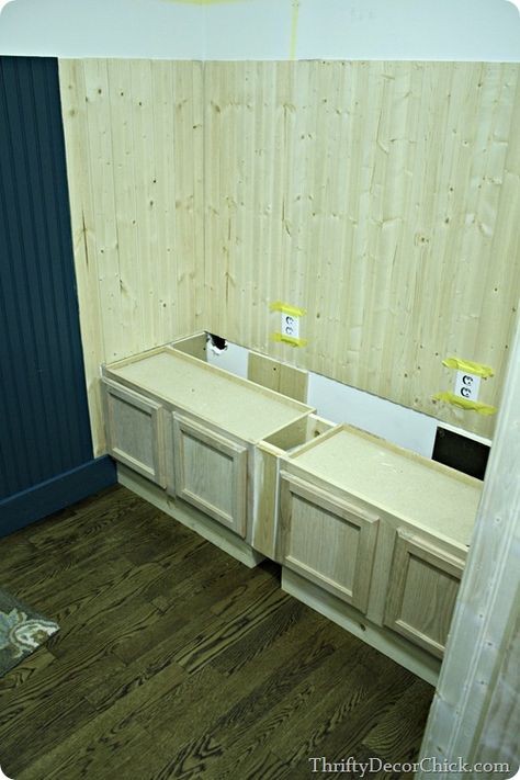 Building a mud room bench with kitchen cabinets -- so inexpensive! Mud Room Bench, Laundry Room/mudroom, Laundry Room/mud Room, Mud Room Entry, Room Bench, Mudroom Laundry Room, Thrifty Decor Chick, Thrifty Decor, Laundry Mud Room