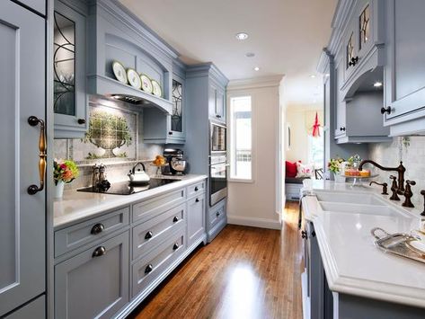 Influenced by an English cottage design, this blue traditional kitchen emphasizes the quaint and soft details of that style. Cottage Kitchens, Galley Kitchen Layout, Galley Kitchen Design, Galley Kitchen Remodel, Galley Style Kitchen, Galley Kitchens, Kitchen Designs Layout, Wooden Floors, Galley Kitchen