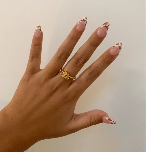 Printed French Tip Nails, Brown French Tip Nails Flowers, Brown Cowprint Nails Designs, Brown Daisy Nails, Shades Of Brown French Tip Nails, French Tip Nails With Brown, Brown Cowprint Nails, Cow French Tip Nails, Western French Tip Nails