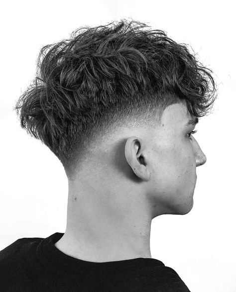 Good Haircuts For Curly Hair Men, Drop Fade Wavy Hair, Low Taller Fade, Fade Blonde Hair Men, Men’s Drop Fade Haircut, Hairstyles For Short Hair Men Fade, Prom Haircuts For Guys, Mid Fade Fluffy Fringe, Bust Fade Haircut