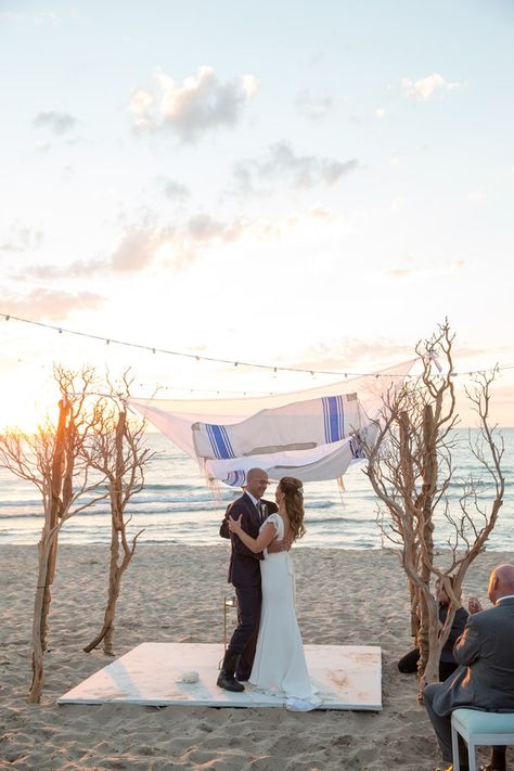 Heath & Brook had a South Haven, Michigan beach wedding on the shores of Lake Michigan at Sunset, followed by a gorgeous reception! Makeup: Makeup by Aga Hair: Parto Naderi Creation De Beaute Dress: Vera Wang Groom's Attire: Formally Modern Tuxedo Planning: Rachel De Marte, Plan Style Party Decor & Florist: Event Creative Catering: Catering By Michael's Entertainment: DJ Greg Corner Videography: Ben Vogel Michigan Beach Wedding, Reception Makeup, Creative Catering, South Haven Michigan, Modern Tuxedo, Groom's Attire, Lake Michigan Beaches, Michigan Beaches, South Haven