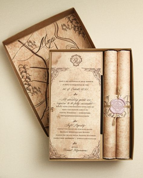 This vintage box invitation will take you do a whole new world. It was such a pleasure to take on this unique project. Wrote about this project in the website. Link in bio :) #weddingph #invitationsph #weddinginvitation #invitationsuite #boxinvitation #bespokeinvitation #calligraphyph Rolled Up Invitations Ideas, Scroll Wedding Invitations Vintage, Regency Era Wedding Invitations, History Themed Wedding, Old Wedding Invitations, Wedding Invitation Vintage, Fantasy Wedding Invitations, Wedding Card Unique, Unique Wedding Invitations Elegant