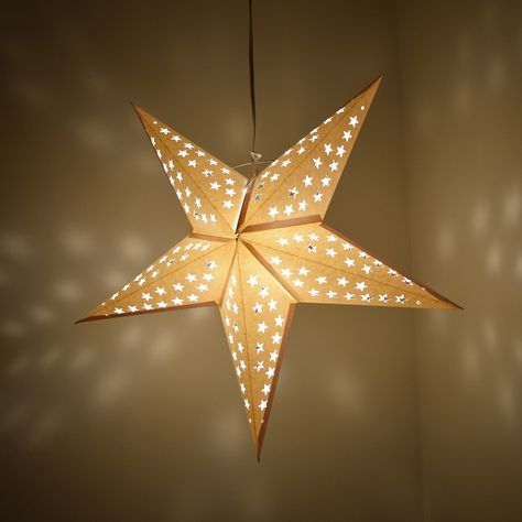 Are you looking for hanging starlights? Handmade paper star lanterns are our specialty. The decorative and lighting possibilities are endless with these beautiful, handmade star lanterns! They are a creative option as an interior decor accessory. These star lanterns are crafted using thick paper and punched with star cutouts that create a wonderful effect when lit. Our star lamps have been featured on TV shows, movies, and at large public events. You can represent your team colors at the big gam Paper Lantern Lamp, Paper Lantern Bedroom, Paper Lanterns Bedroom, Star Lamps, Diy Paper Lanterns, Lanterns Bedroom, Paper Star Lanterns, Paper Lanterns Diy, Star Lanterns