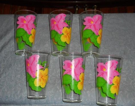 ACRYLIC  FLORAL TUMBLERS Plastic Set of 6 This is a set of 6 Acrylic Floral Tumblers.  I believe these are from the 80's but not quite sure.  Each of these plastic tumblers is in nice  condition. There are no breaks, cracks or mends. There is some scratching here and there but great, vibrant color - very nice. Each tumbler holds 16 ounces. They are perfect for summer. Measures 3" diameter at the top x 6 1/4"  Would make a great addition to anyone's kitchen collection. Please see other kitchenware items in my shop. www.etsy.com/shop/rosiestreasuretrove I am happy to combine shipping.  Please convo me for a shipping quote. Floral, Plastic Tumblers, The 80's, Kitchen Collection, I Am Happy, Tumbler, Vibrant Colors, Color