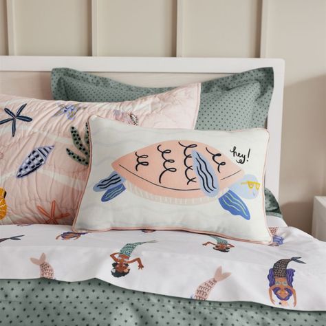 Because bedtime should be cause for shell-abration. Featuring a menagerie of mermaids, our Kaia pillowcase is total #squadgoals with an inclusive design made for all who dream of deep-sea adventures. A soft ivory background helps bring the colorful scene to life, while the organic cotton fabric offers little ones all-season coziness.Allover mermaid pattern on white background100% organic cottonPillowcases sold individuallyMachine wash cold; tumble dry lowDo not bleach; do not iron; do not dry cl Mermaid Sheets, Mermaid Quilt, Dinosaur Bedding, Blue Pillow Shams, Mermaid Bedding, Sea Style, Mermaid Kids, Kids Sheets, Kids Pillow Cases