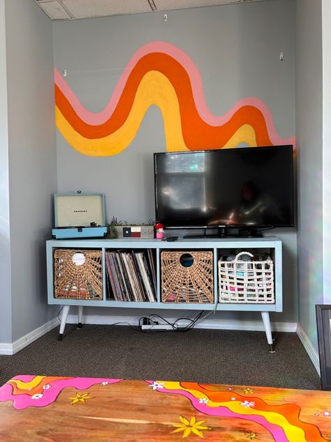 Painted my wall and coffee table a very mcm groovy rainbow. All the good vibes in my house Groovy Hallway Decor, Groovy Coffee Table, Groovy Office Decor, Groovy Home Decor, Groovy Apartment, Groovy Office, Groovy Bedroom, Living Room Wall Shelves, Room Wall Shelves