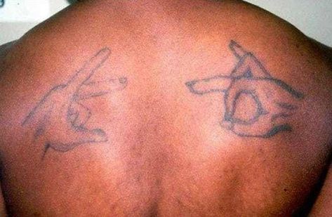 Common Gang Tattoos And What They Mean Gang Related Tattoos, Gang Signs Meanings, Gang Tattoo Ideas, Crip Tattoos, Gang Symbols, Cross Tattoo On Hand, Cross Tattoo Meaning, Outlaw Tattoo, Gang Tattoos