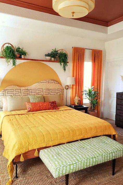 Here's how to get this funky, fun look in your own home. From patterns to colors, here's what you need to know. #eclectichomedecor #colorfulhomedecor #apartmentdecor #apartmentdecoratingonabudget #apartmentliving #smallspacedecorating #thespruce Mid Century Eclectic Bedroom, Modern Boho Bedroom, Mid Century Bedroom, Spring Bedroom, Mid Century Modern Bedroom, Appartement Design, Eclectic Bedroom, Boho Bedroom Decor, Long Periods