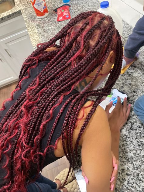 Red Boho braids Red Braids Curly Ends, Dark Red Cornrows, Red Peekaboo Goddess Braids, Burgundy And Red Braids, Dark Red Hair Braids, Red And Ginger Braids, Red Goddess Knotless Braids, Dark Red Goddess Braids, Red And Black Goddess Braids