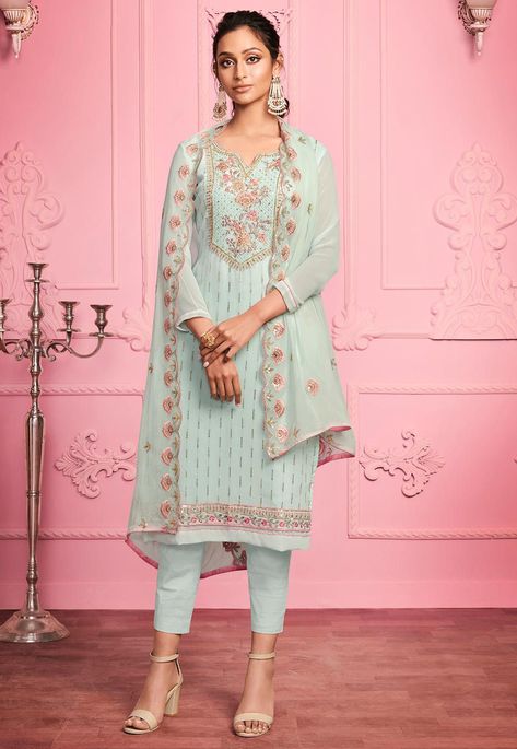 Semi-stitched Faux Georgette Pakistani Suit in Light Sea Green This Notched Round Neck and Quarter Sleeve attire with Poly Shantoon Lining is Prettified with Resham, Zari, Sequins, Stone and Cutbeads Work Available with a Poly Shantoon Pant and a Scalloped Faux Georgette Dupatta in Light Sea Green The Kameez and Bottom Lengths are 46 and 38 inches respectively Do note: The Length may vary upto 2 inches. Accessories shown in the image are for presentation purposes only.(Slight variation in actua Couture, Pakistani Suit With Pants, Lehenga Choli Latest, Pakistani Lehenga, Celana Fashion, Georgette Dupatta, Gaun Fashion, Georgette Tops, Embroidered Pants