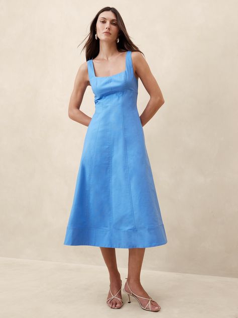 This softly structured midi dress uses a paneled construction to mimic the look and fit of a bustier bodice.  Crafted in a soft, cotton poplin we love for its variegated texture.  Fit & flare.  Dolman sleeves.  Square neck.  Square back.  Zipper closure at back.  Fully lined.  Fit & flare.  Sleeveless.  Midi length.  Model: Size 2, 5'10" (178cm). Bright Blue Dresses, Linen Style Fashion, Square Neck Midi Dress, Midi Dress Blue, Blue City, Mini Dress Casual, Workwear Dress, Women's Sweaters, Banana Republic Dress