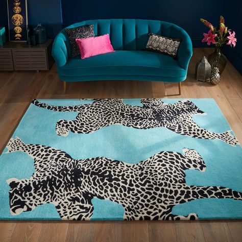 PRICES MAY VARY. PREMIUM NEW ZEALAND WOOL RUG: Indulge in the exceptional quality of our rug, crafted from 100% New Zealand wool, known for its ultimate comfort and superior durability. Perfect for high-traffic areas in your home. UNIQUE JAGUAR DESIGN: Our unique, black and white Jaguar animal print design adds a stylish touch to any room. This statement piece effortlessly enhances modern, contemporary, and bohemian home décor styles. HANDMADE INDIAN CRAFTSMANSHIP: Our rugs are handmade by skill Leopard Carpet, Leopard Print Rug, Leopard Rug, Tiger Rug, Modern Wool Rugs, Artisan Rugs, Rug For Living Room, Green Area Rugs, Stunning Rugs
