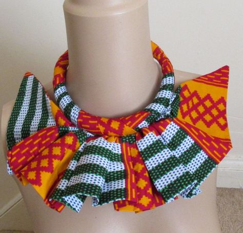 WHO MADE IT FIRST? IMITATION CAN BE A FORM OF FLATTERY but note the if you see this design someone else the person copied me. Beautiful African Kente print bib necklace to accessorize and brighten your outfit.  It has matching bangles and earrings. Note that each is unique so the one you receive will not be exactly like the one in the photo.. Due to the nature of hand crafted items any irregularities or glue residue is part of the bespoke process. Thanks for buying handmade Tela, Brides Maid Dresses Blue, Africa Necklace, Kente Print, Blue Bride, Style Africain, Egyptian Queen, Rope Jewelry, Wax Fabric