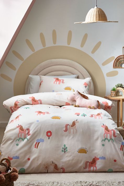 Get them set for bedtime and snuggled up in our cosy duvet cover and pillowcase set. Made in a practical polyester/cotton blend it is designed to be fast-drying and require minimal ironing. In a range of fun designs and prints. Machine washable. Duvet Cover and Pillowcase:52% Recycled polyester,48% Cotton Toddler Girl Unicorn Bedroom, Kids Bed Cover, Unicorn Duvet Cover, Kids Single Beds, Textured Duvet Cover, Textured Duvet, Unicorn Bedding, Unicorn Bedroom, Black Duvet