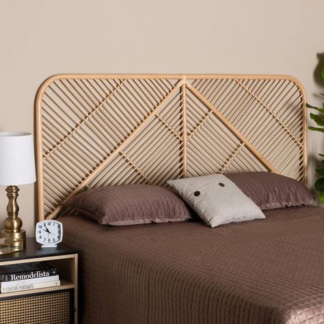 Realize a connection with exotic beauty in your space with the lovely Walid headboard. Made in Indonesia, this bohemian inspired piece is handcrafted from natural rattan. Its broad outline is interlaid with slim rattan rods for an airy, lightweight design with rich geometry. The Walid will arrive fully assembled and features a standalone design that sits snuggly between the bed frame and wall with no mounting required. Granting a quality of subtle serenity, the Walid headboard is a remarkable be Boho Bed Frame, Rattan Bed Frame, Bohemian Headboard, Rattan Bedroom, Boho Headboard, Rattan Bed, Rattan Headboard, Headboard With Lights, Queen Size Headboard