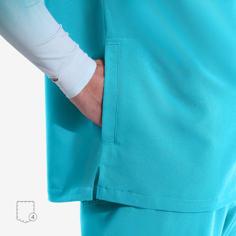 Effortlessly exude a polished and professional image. This scrub top, with its classic fit and complementing knit ribbed collar, strikes the perfect balance between style and sophistication. Scrub Top Classic fit Knit ribbed collar Zipper placket closure Shoulder elastic cords for accessories One chest pocket and pencil pocket Two deep welt hand pockets Back yoke with box pleat Side-slit hem Zipper Placket, Professional Image, Dark Grey, Pencil, Elastic, Zipper