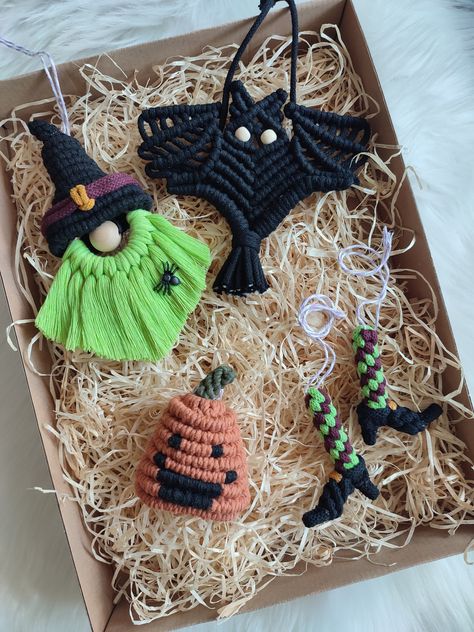 Beautiful handmade macrame Halloween ornaments made from recycled cotton yarn. They look perfect on walls, door handles or anywhere around the house. Inside the box you can find 5 decorations. Halloween box  1. Halloween Gnome 2. Bat 3. Pumpkin 4. Witch leg 5. Witch leg All ornaments are packed in a minimalistic box and placed on wood wool. Are ready to be delivered as a gift! The box will be perfect for people who love crafts or like to surround themselves with unique objects. The color and als Macrame Diy Gift Ideas, Macrame Witch Hat, Halloween Macrame Ideas, Macrame Witch, Witchy Macrame, Unique Macrame Ideas, Macrame People, Macrame Halloween, Macrame Pumpkin
