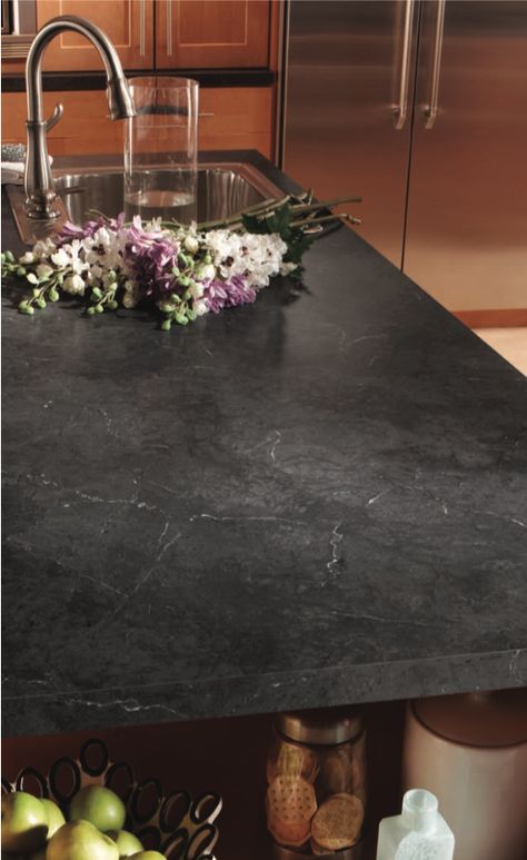 The Black Alicante HPL (High-Pressure Laminate) from Wilsonart’s Marble series featured on this countertop is a perfect subtle dark design for any kitchen or bath design🖤 #modernkitchen #hpl #wilsonart Catani Cabinets is proud to have Wilsonart as one of the suppliers of the high-quality materials we are dedicated to using in every Catani remodel. Learn more about how we revitalize kitchens and baths by checking out our YouTube channel below! 👇 Essen, Black Concrete Countertops White Cabinets, Dekton Countertops Black, Black Alicante Laminate Countertops, Black Laminate Countertop, Black Laminate Countertops Kitchen, Dark Grey Marble Countertops Kitchen, Dark Formica Countertops, Dark Stone Benchtop Kitchen