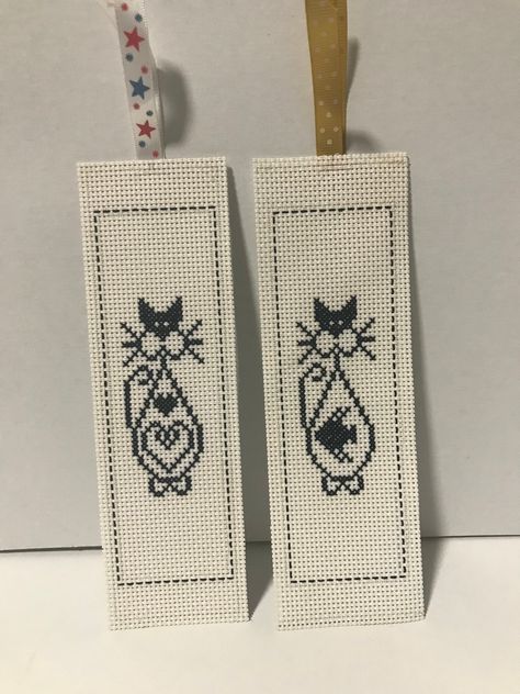 Black cat cross stitched bookmark.  Choice of 2, selection as in photos, one with fish inside his tummy, the other with a heart.   Stitched on 14 ct. plastic sheeting backed with white felt. Coloured ribbon on the top to peep out of the top of the book. Suitable for those who love real books, ideal gift for that book lover and avid reader.  Something different for that special person.  Made I smoke free, pet free home.  Not washable, wipe damp cloth if needed. Books not included. Couture, Black Cat Cross Stitch, Cross Stitch Easy, Cat Bookmark, Blackwork Cross Stitch, Cross Stitch Bookmarks, Book Marks, Cat Cross Stitch, Christmas Table Runner