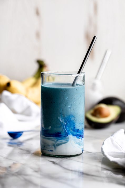 blue smoothie in a glass with coconut cream swirl and straw with banana and avocado in background Coconut Cloud Smoothie, Smoothie Inspiration, Cloud Smoothie, Meals Inspiration, Blue Smoothie, Coconut Cloud, Banana Avocado, Banana Drinks, Yummy Meals
