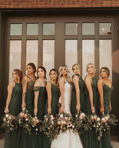 Modern, moody bridesmaids dresses all deep forest green, each a unique style to make each member feel her absolute best!