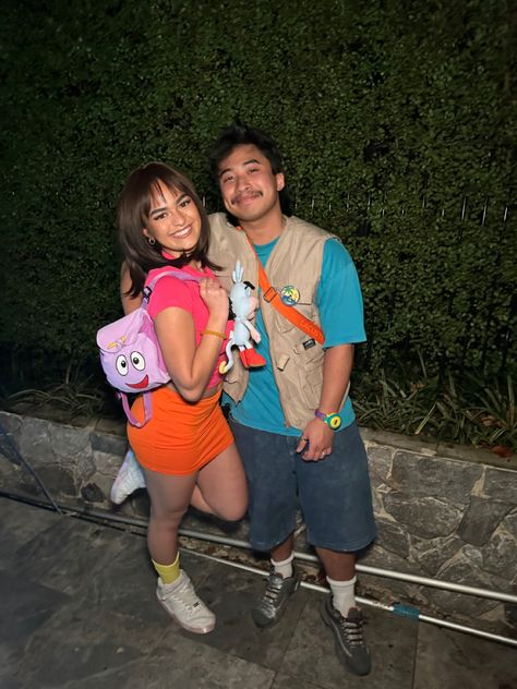 dora and diego costume Dora Custome, Matching Costume Halloween, Halloween Costumes Couples Mexican, Guy Duo Costumes, Dora And Backpack Costume, Two Guys Halloween Costume, Dora And Diego Couple Costume, Dora And Diego Costume Halloween, Couples Duo Costumes