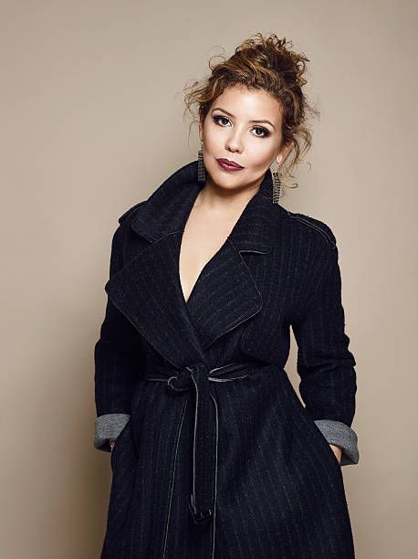 Love this idea of an overcoat - either in a dark color like this, or even a traditional khaki color. Very simple, could also be used for a more sophisticated corporate vibe or successful woman vibe - but also seductive. Hair and accessories are very simple here. Penelope Alvarez, Euphemia Potter, Justina Machado, Gotham Series, Queen Of The South, Rivers Edge, Successful Woman, Intelligent Women, Latina Fashion