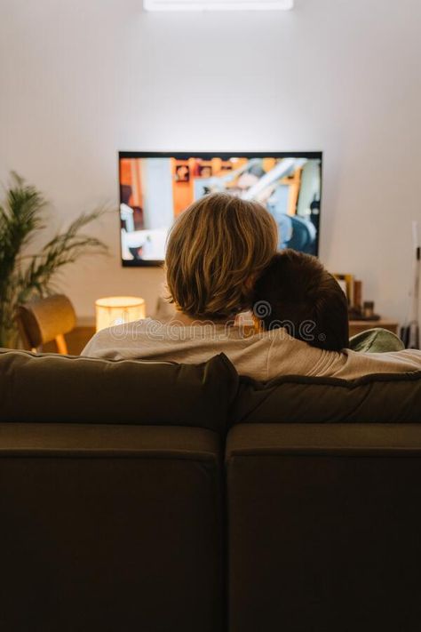 Young gay couple hugging and resting on couch while watching tv royalty free stock images Couples Watching Tv Together, Couple Hugging On Couch, Couple In Couch, Couple Watching Movie On Couch, Couple Watching Tv Aesthetic, Couple On A Couch, Couple On Sofa, Couple Watching Tv, Christian Relationship