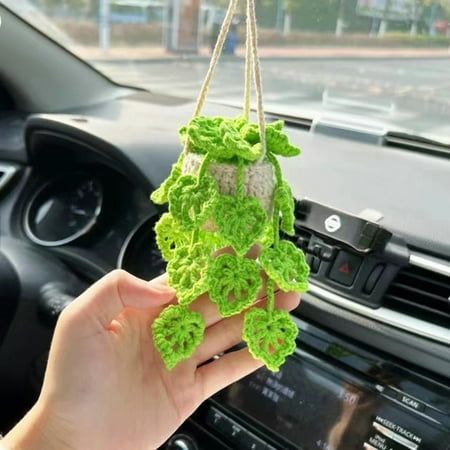 Soft & Safe Material: The car crochet hanging plant is crafted from yarn, which is soft, safe, and odorless. Add a touch of nature to your car or home decor with this charming mini potted plant pendant. Versatile Decoration: Perfect for hanging in your car's interior or enhancing your home decor, this cute succulent accessory adds a natural element to any space. It also makes an excellent Christmas gift, wedding present, or birthday surprise for friends and family. Durable & Long-lasting: Designed with care using crochet hooks, this small car fern is not only visually appealing but also highly durable. Enjoy the beauty of greenery without worrying about wilting or maintenance. Adjustable Rope Length: Customize the hanging length of the rope according to your car's environment to ensure it Pot Gantung, Crochet Succulent, Crochet Mignon, Crochet Car, Crochet Plant, Fun Crochet Projects, Knitting Wool, Crochet Diy, Crochet Design