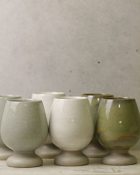 Helen & Danielle Cattell on Instagram: "Wine cups in sage, snow and luscious jade glazes. We have lots of pottery in our house, as you would expect. We have a lot of pieces going out of our studio each week. There are many pieces that come out of the kiln that I stop to admire and tell Danielle what wonderful work she is producing. But when these wine cups came out, I was in awe. I really did not want to let this set go. It is stunning in both design and function. Danielle promised me s Ceramics Wine Cup, Pottery Glass Ideas, Ceramic Drinking Cups, Pottery Wine Goblets, Clay Wine Cup, Ceramic Wine Goblet, Ceramic Drinking Vessels, Ceramic Wine Glasses Pottery, Pottery Wine Glasses