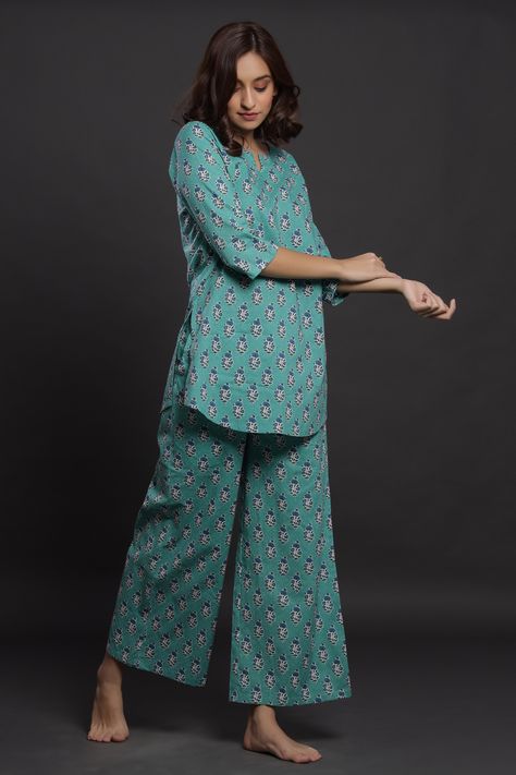 Combine style and comfort with lightweight cotton nightsuits for summers crafted with good quality fabrics and soothing colours. #casualoutfits #summerdresses #cottonfabrics #nightwear #sleepwear #bridesmaidgifts #womenloungewear #cottonnightsuits #nightsuitsforgirls #nightsuitsets #peplumtops #athomestyles Cotton Sets For Women, Lounge Wear Indian, Nightsuits For Women Summer, Night Dress For Women Cotton Night Dress For Women, Cotton Coordsets For Women, Indian Night Dress, Cotton Night Dress For Women, Simple Night Dress, Cotton Night Suits For Women