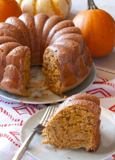 Pumpkin spice bundt cake with a slice on a plate with a fork Pastel, Pumpkin Spice Bundt Cake, Spice Bundt Cake, Low Calorie Pumpkin, Homemade Cider, Unique Cakes Recipes, Thanksgiving Pie Recipes, Pumpkin Bundt, Nothing Bundt