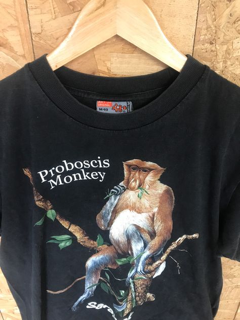 "Vintage 90s Sarawak Borneo animal scene proboscis monkey t shirt size medium Pit to pit: 20\" Collar to hem: 25\"" Proboscis Monkey, Monkey Shirt, Monkey T Shirt, Fun Shirt, Virtual Closet, Animal Shirts, Ugly Sweater, Vintage 90s, New Outfits