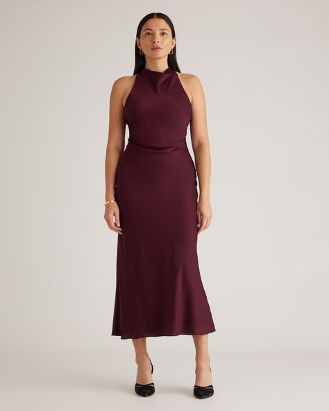 A new capsule must: our Washable Stretch Silk High Neck Midi Dress. Designed with a classic high neck and a flattering silhouette, this dress is cinched at the waist with crossed shoulder straps in the back. Like all of our silk, it’s washable, hypoallergenic, and thermoregulating to keep you comfortable.  | Quince | Women's Washable Stretch Silk High Neck Midi Dress in Wine Tasting, Size XS, Mulberry Silk Wedding Dress Code Guide, Dress Code Guide, Wardrobe Color Guide, Wine Colored Dresses, High Neck Midi Dress, Dress Code Wedding, Halter Midi Dress, Fashion Wishlist, Burgundy Dress