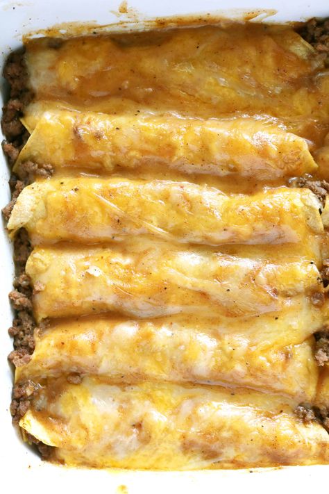 A close up shot of Tex Mex Beef Enchiladas in a rectangle white baking dish. Dinner Recipes Comfort Foods, Enchiladas Dinner, Homemade Beef Gravy, Chili Gravy, Enchiladas Beef, Beef Enchilada Recipe, Ground Beef Enchiladas, Dinner Beef, Authentic Mexican Recipes