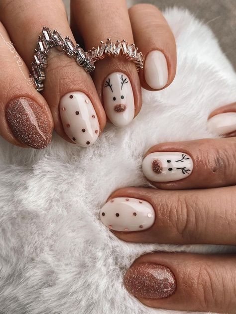 short Christmas nails: shimmery brown and white with Rudolph Christmas Nails And New Years, Christmas/newyears Nails, Thanksgiving Crafts Second Grade, Xmas Nail Inspo 2023, Luminary Christmas Nails, Starry Gel Nails, How To Gel Nail Designs, Winter Almond Nails Short, Holiday Natural Nails