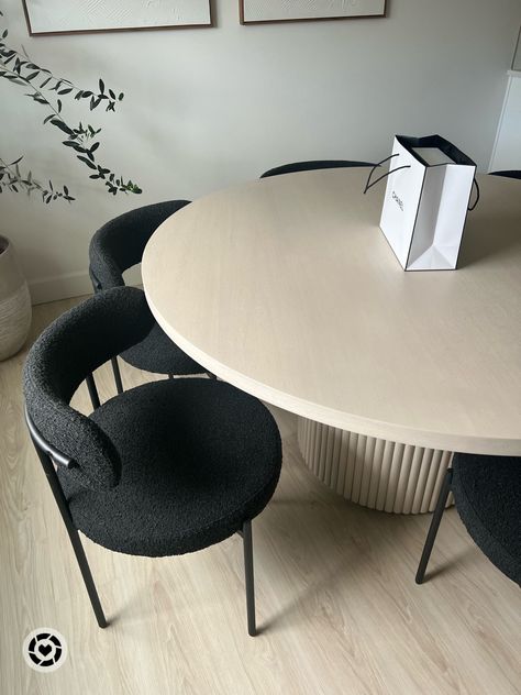 Black boucle. Round dining table Dining Table Boucle Chair, Round Dining Table For Small Apartment, Dining Room Boucle Chairs, Circle Table Aesthetic, Black Dining Chairs Round Table, Dining Table With Boucle Chairs, Round Table Chair Ideas, Apartment Dinning Table, Black Boucle Dining Chairs