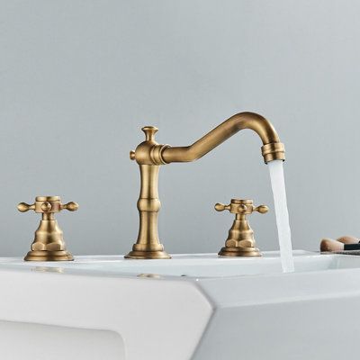 The bathroom faucet sink has 3 holes, and the 2 cross handles are respectively connected to the hot and cold water pipelines to precisely control the temperature and water flow. Antique brass bathroom faucets can save you a lot of time and effort in replacement and maintenance. | Augusts Widespread Bathroom Faucet in Yellow | 8 W in | Wayfair Wall Faucet Bathroom, Vintage Bathroom Faucet, Brass Bathroom Vanity, Antique Brass Bathroom Faucet, Bathroom Vanity Faucet, Waterfall Sink, Antique Brass Faucet, Bathroom Vanity Faucets, Antique Brass Bathroom